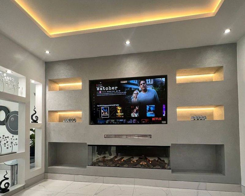 Dark, cinematic bespoke media wall installation, from the North West Bespoke Media Walls site